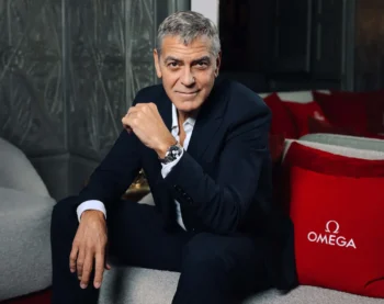 Clooney con Speedmaster Reverse Panda